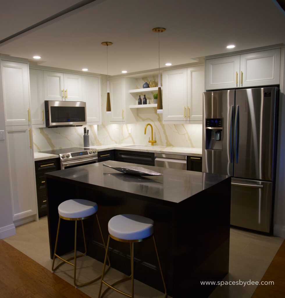 small contemporary black and white condo kitchen with gold accents.