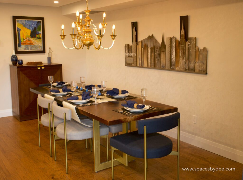fully decorated New york and vintage-inspired dining room with 6 seater table, bar and wall art.